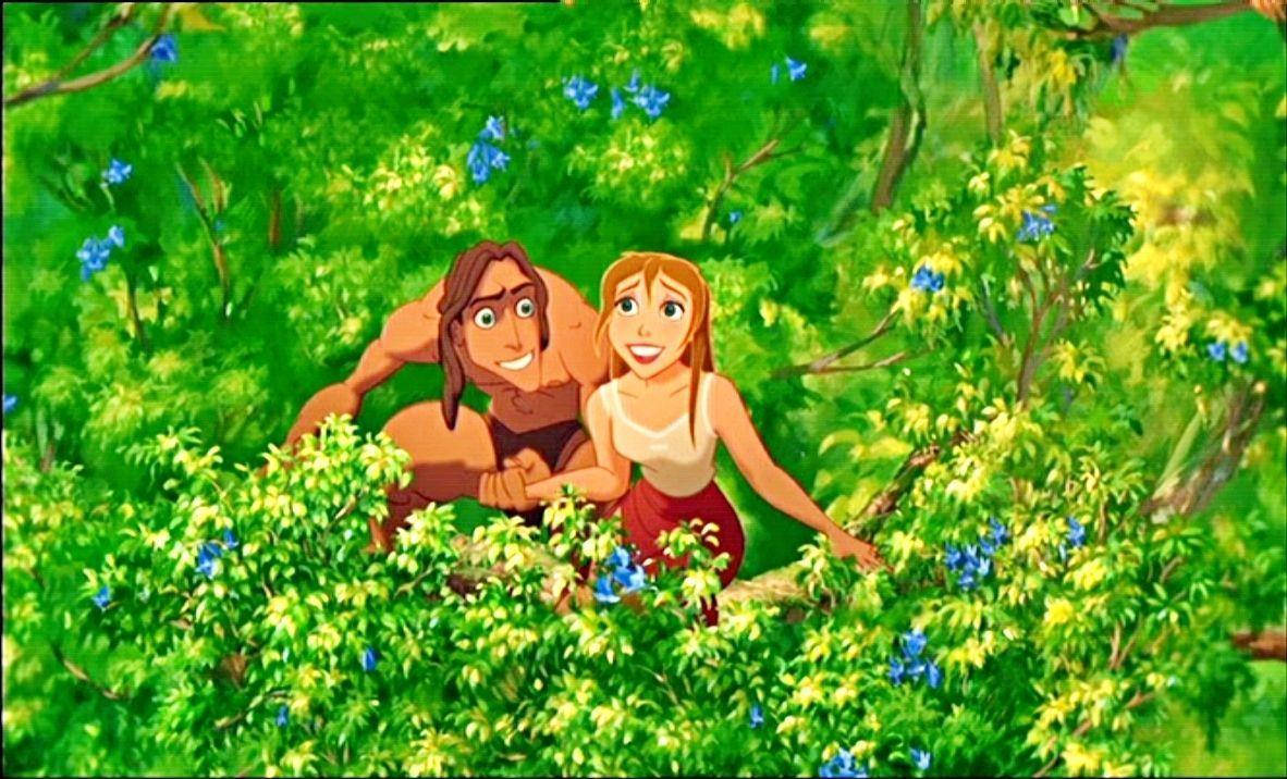 Glade Tarzan og Jane Porter på safari i løvens hule Wallpaper