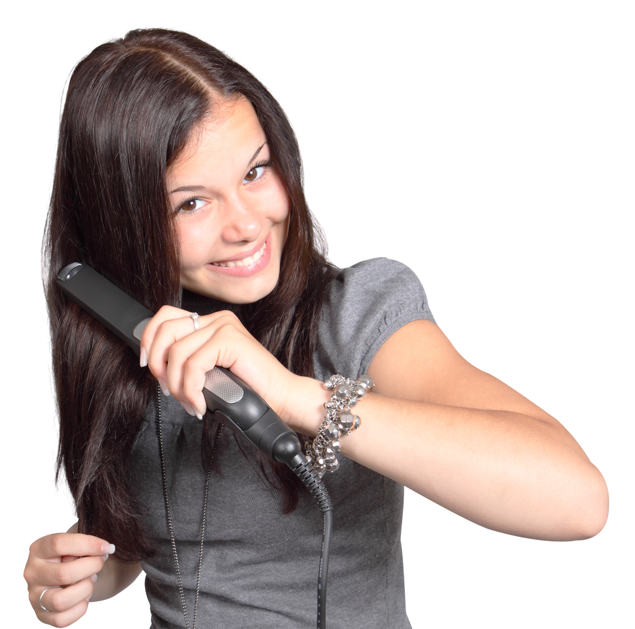 Happy Teen Girl Styling Hairwith Flat Iron PNG
