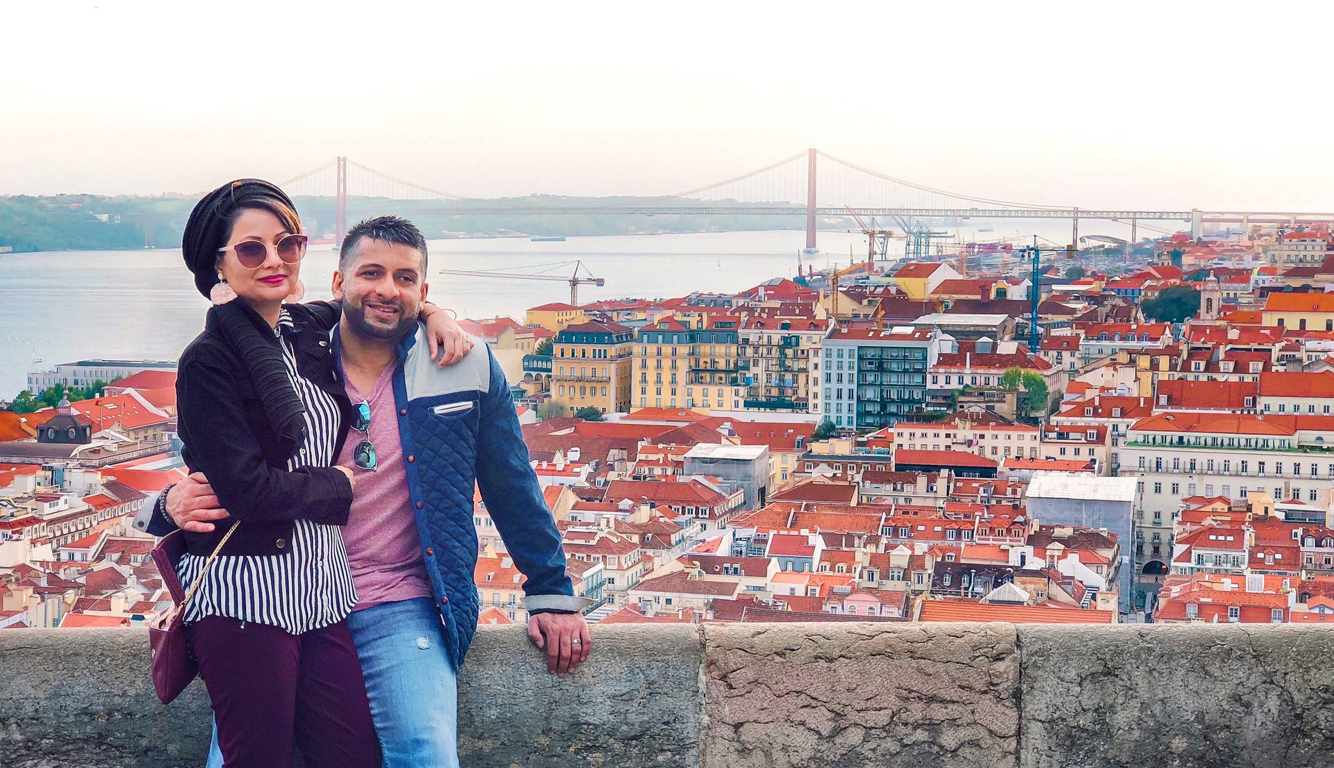 Happy Tourists In Lisbon Wallpaper