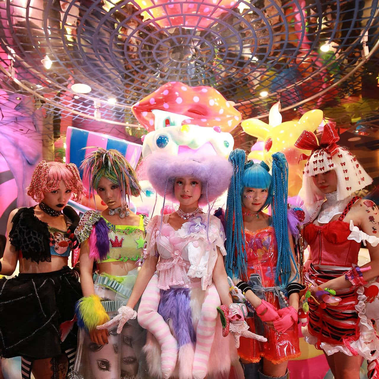 Vibrant Harajuku Fashionistas in Tokyo's Fashion District Wallpaper