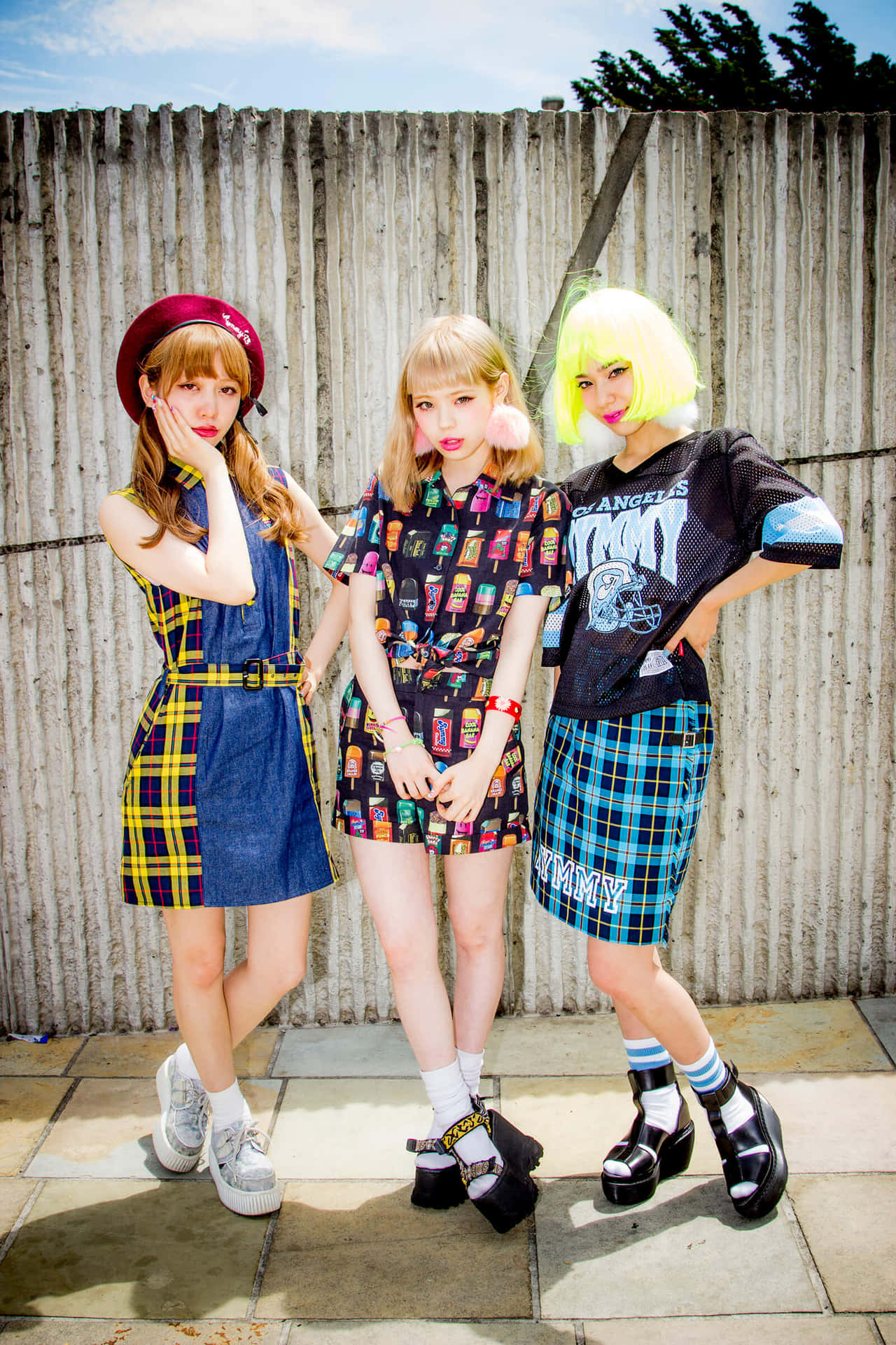 Trendy Harajuku Girls showcasing street fashion in Tokyo Wallpaper