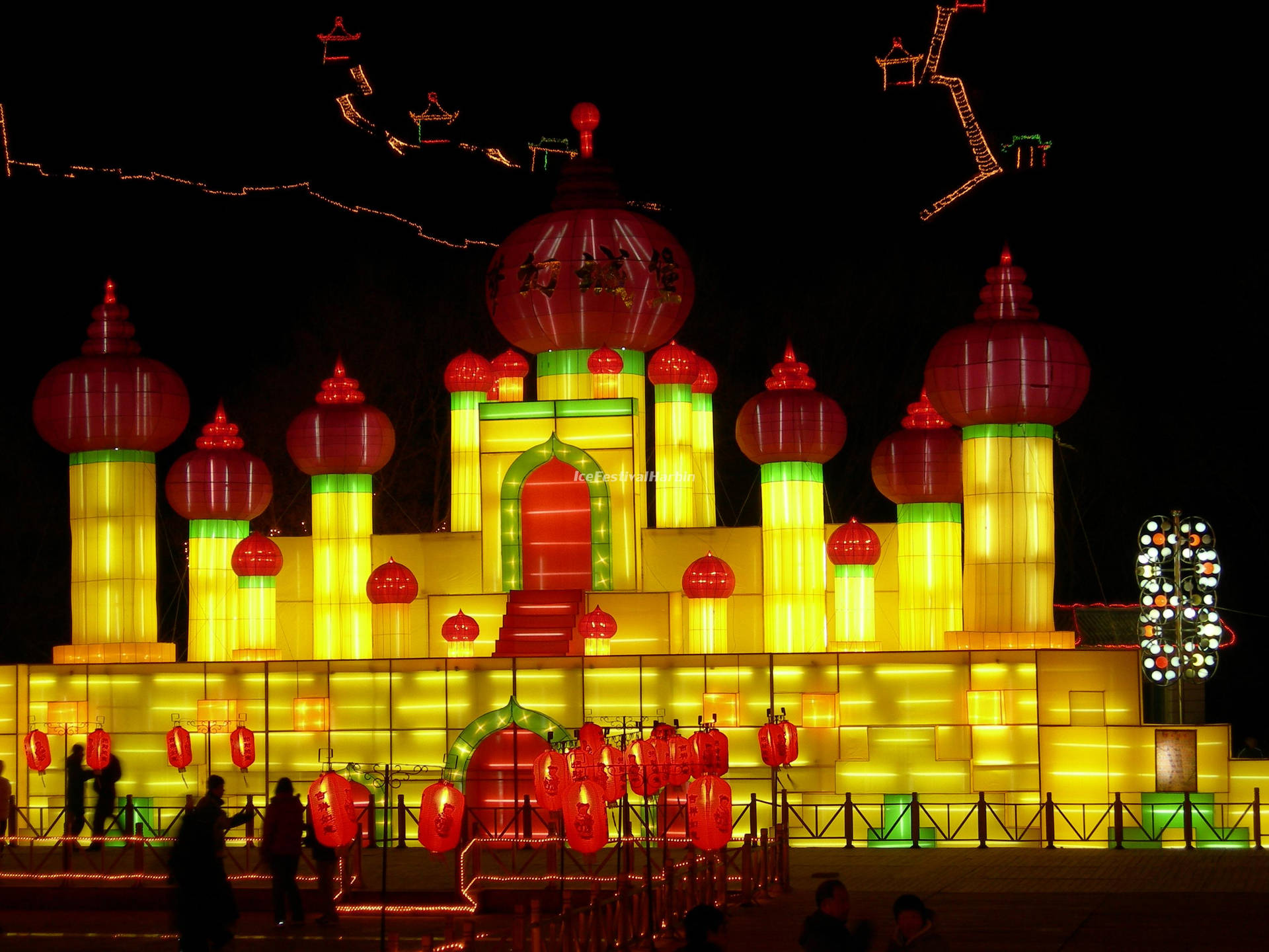 Download Harbin's Dazzling Ice Palace Aglow at Night Wallpaper ...