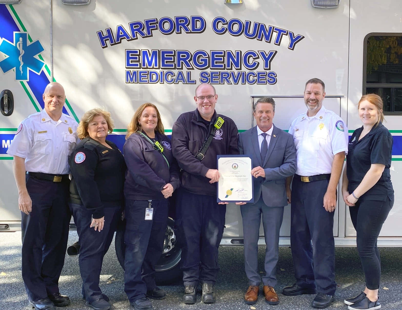 Harford County E M S Team Met Certificaat Achtergrond