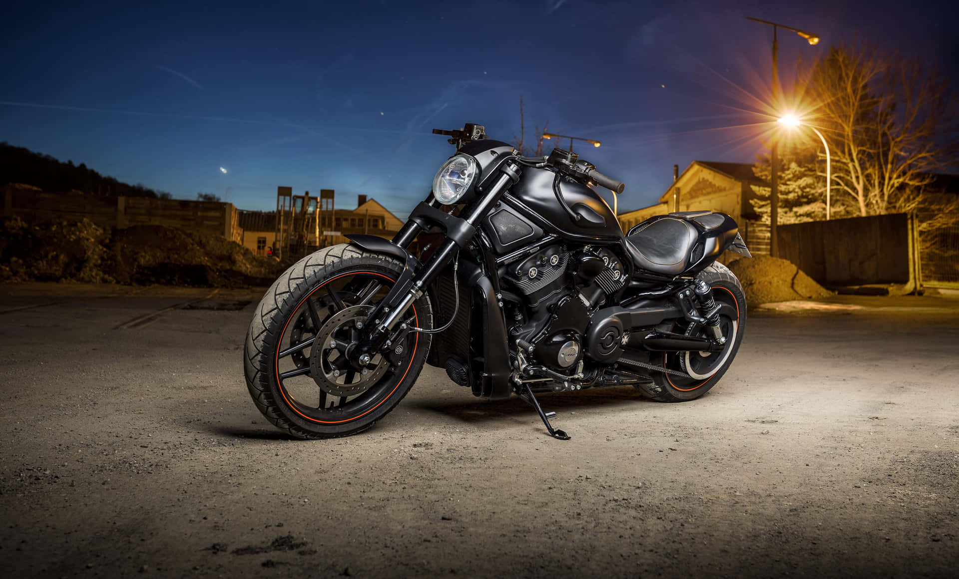 Sfondopaesaggio Con Moto Harley Davidson Nera