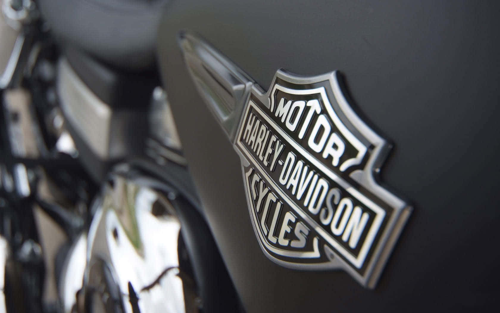 Harley Davidson Logo In Black Motor Background