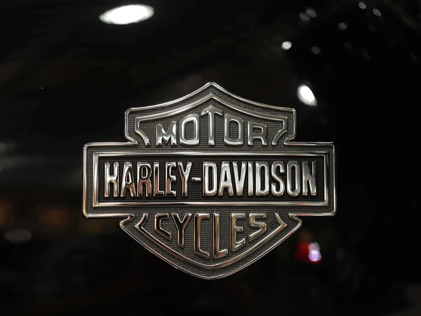 Bakgrundmed Officiell Logotyp Från Harley Davidson Motorcyklar.