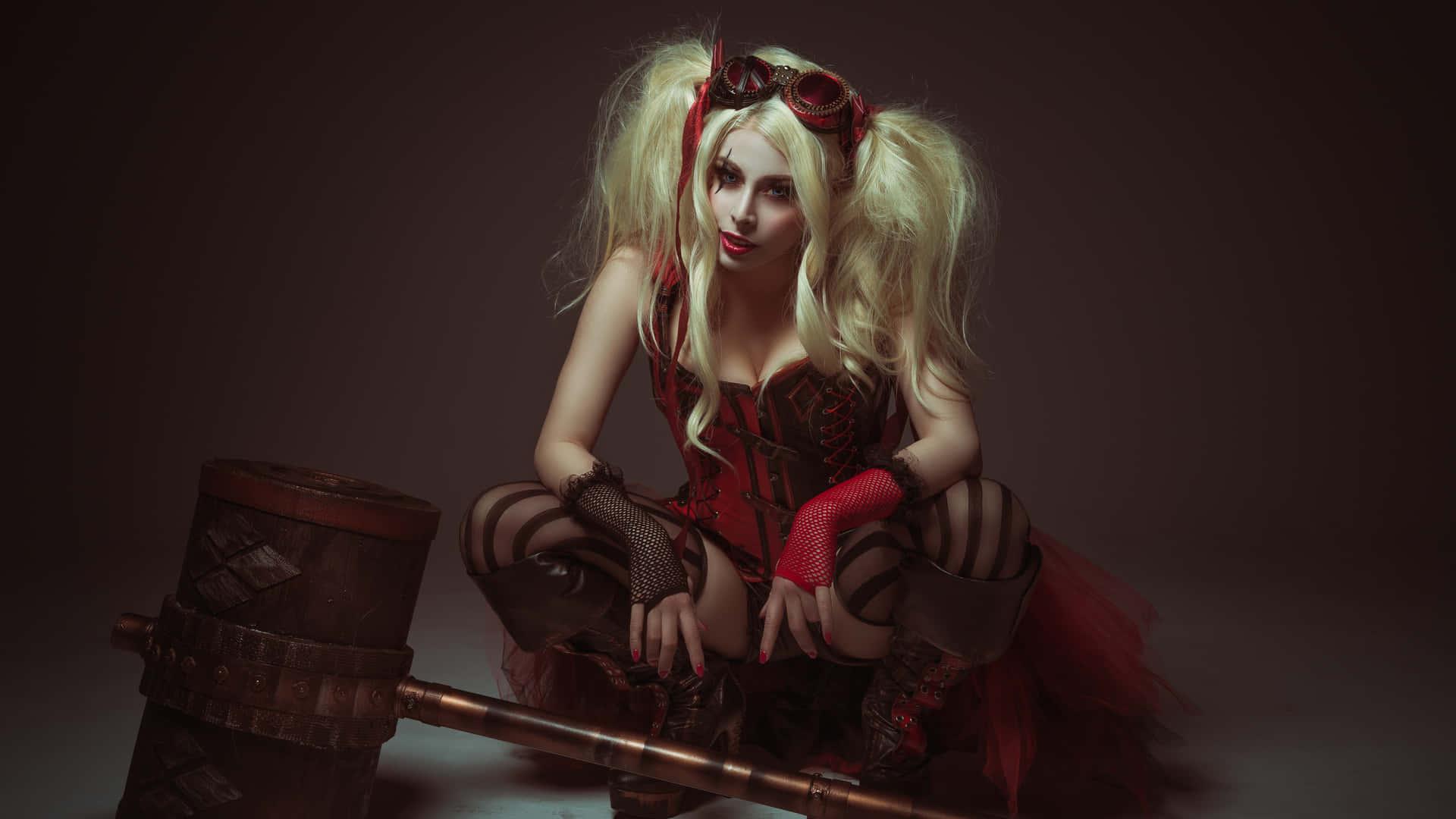 Stunning Harley Quinn Cosplay with a Fiery Twist Wallpaper