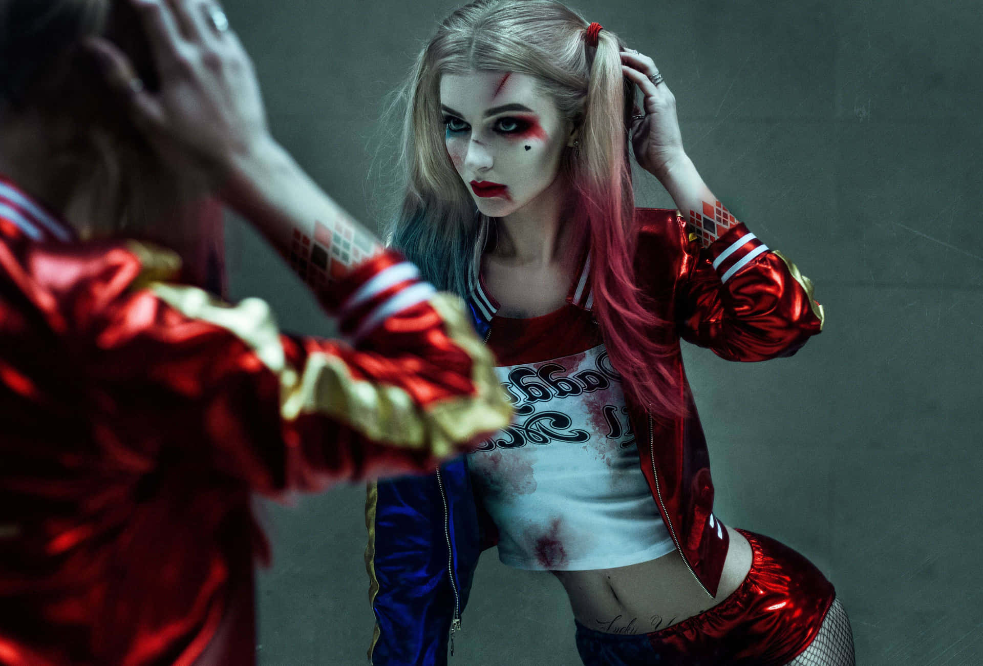 Captivating Harley Quinn Cosplay in Action Wallpaper