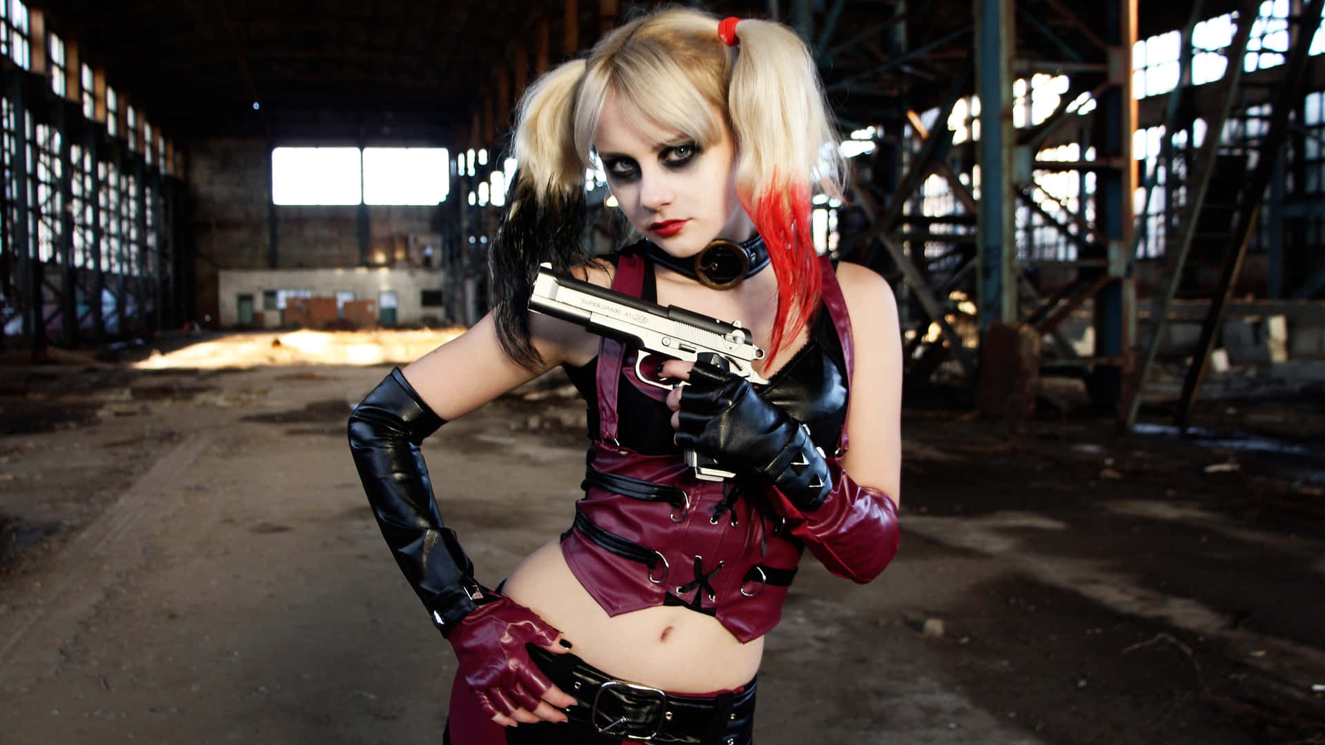 Stunning Harley Quinn Cosplay Strikes a Pose Wallpaper