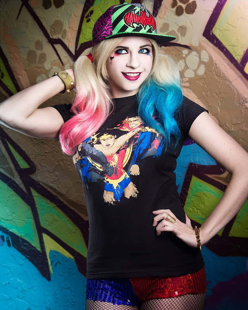 Captivating Harley Quinn Cosplay Posing with a Mallet Wallpaper