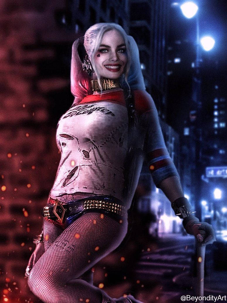 Follow the Joker's lead with Harley Quinn! Wallpaper