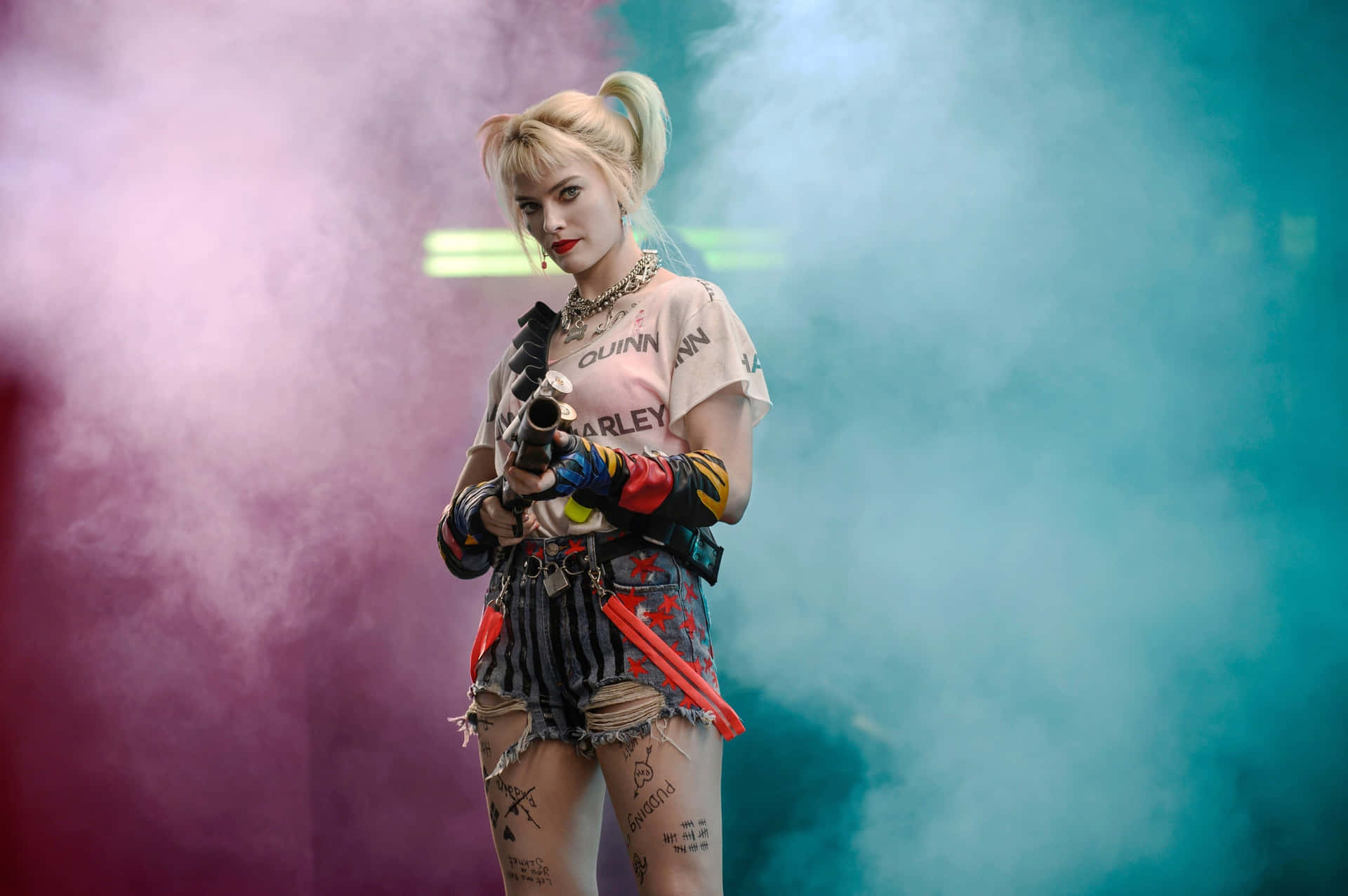 Harley Quinn posing confidently in her iconic Suicide Squad attire Wallpaper