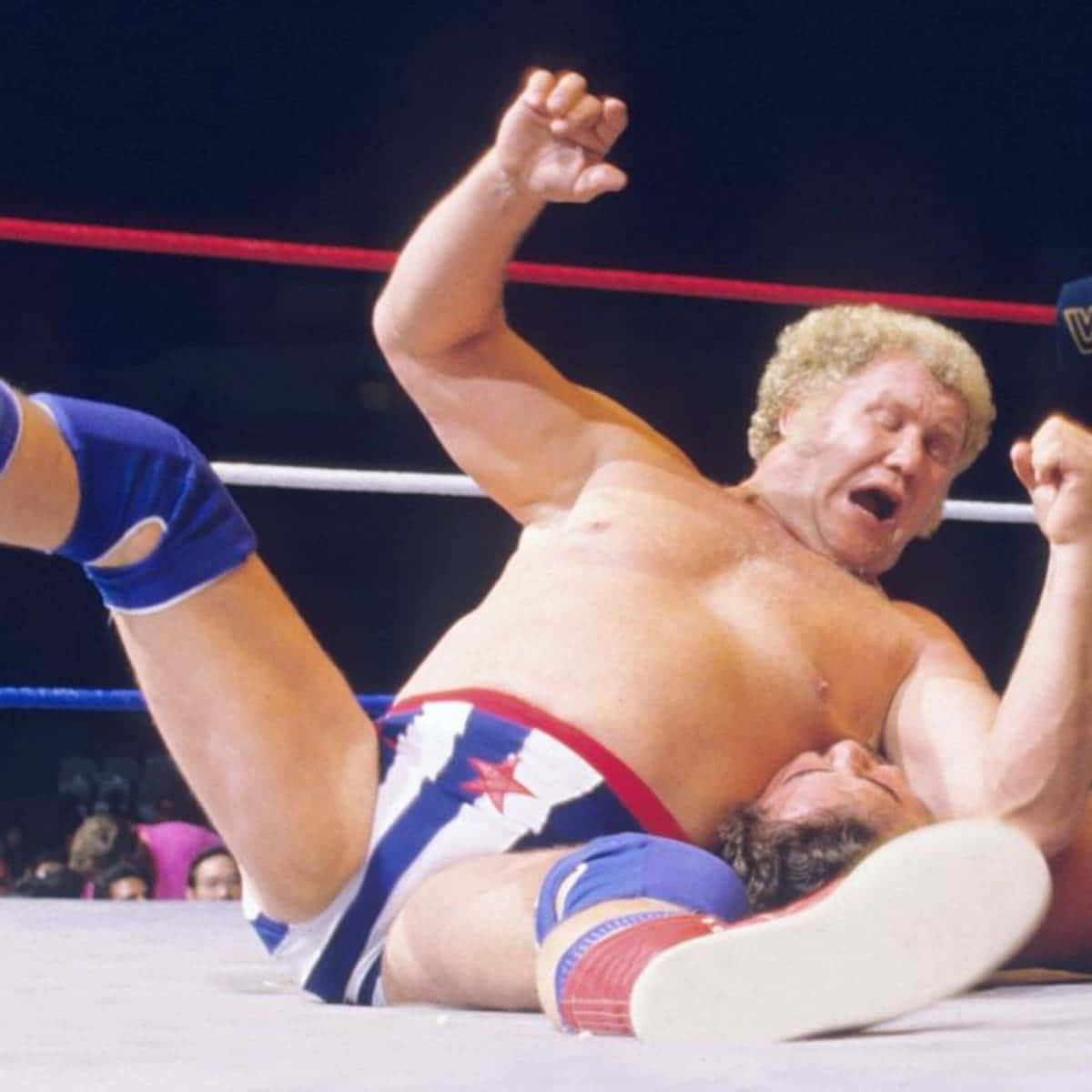 Harley Race Falls Down And Tackles Opponent Wallpaper