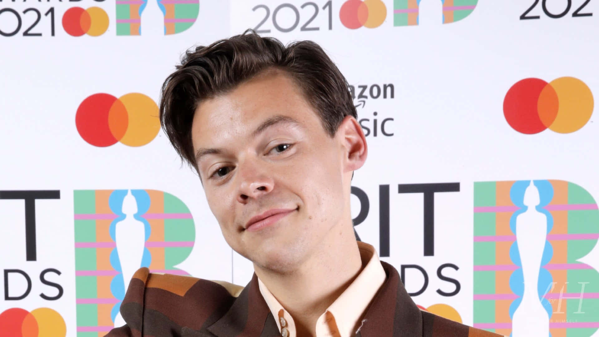 Harry Styles oozing charm and edge in 2021