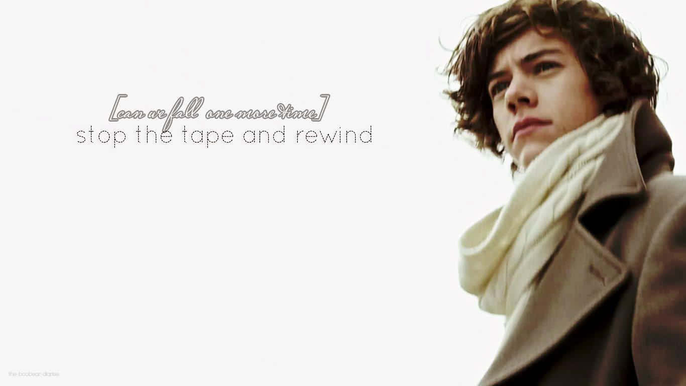 A Man In A Scarf With The Words Stop The Tape And Wind Wallpaper