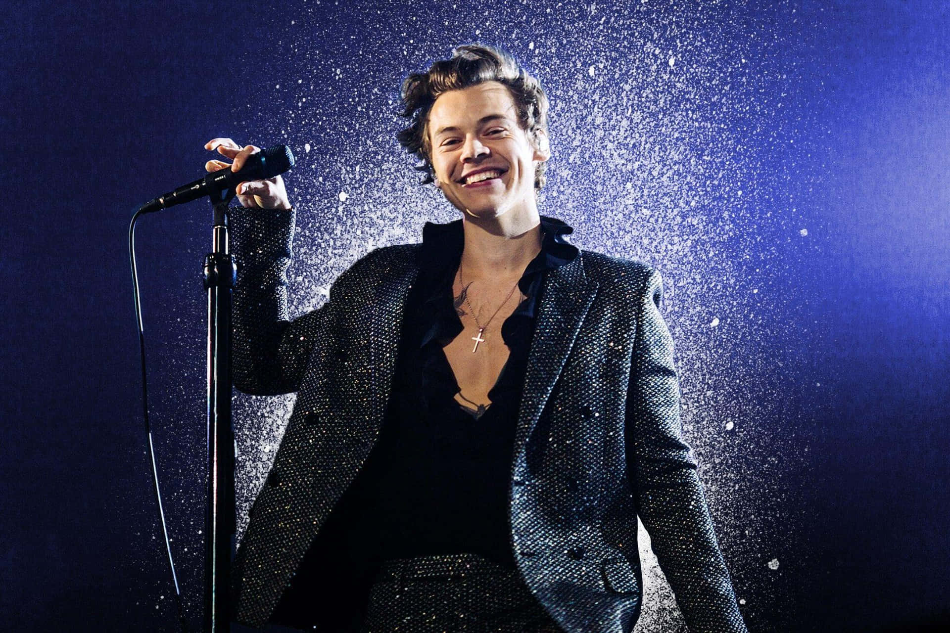 Harry Styles giving a fun performance