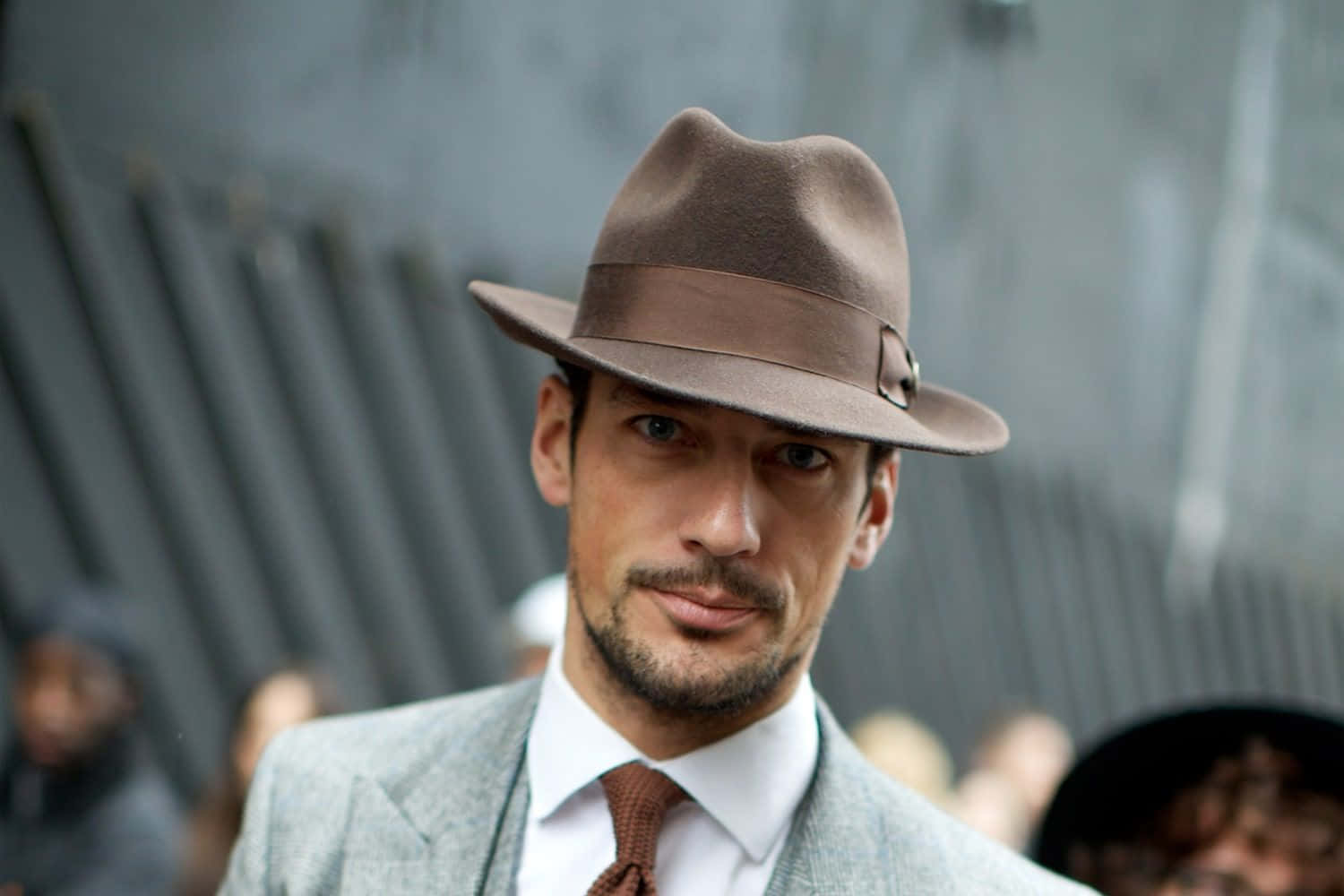 Stylish Man Wearing a Fedora Hat Wallpaper
