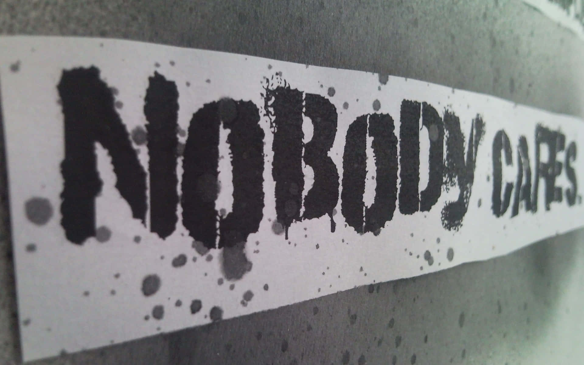 A Sign That Says Nobody Cares Wallpaper