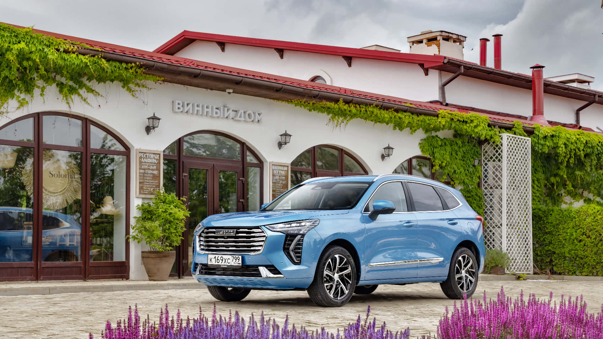 Stunning Haval SUV Overlooking Scenic Mountain Landscape Wallpaper