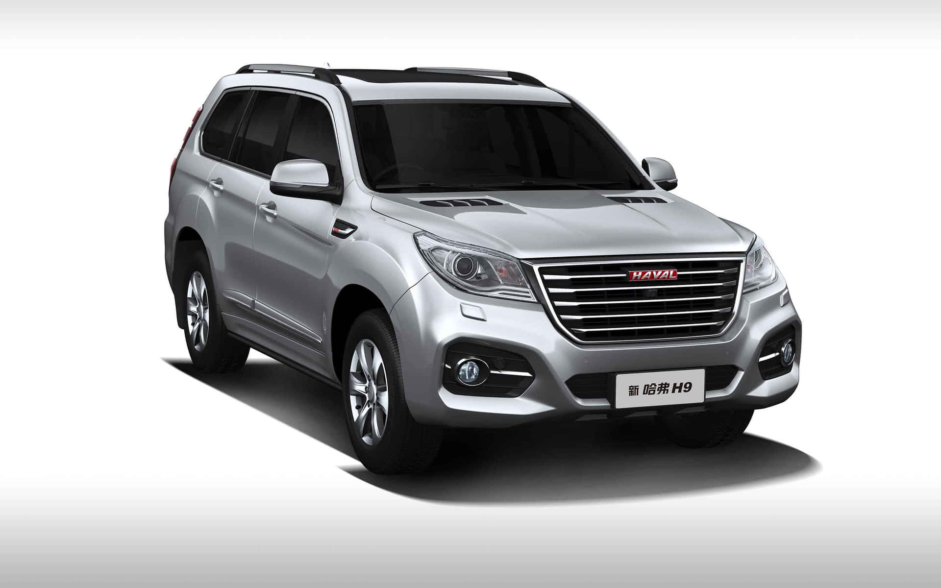 Sleek Haval SUV cruising along the highway Wallpaper