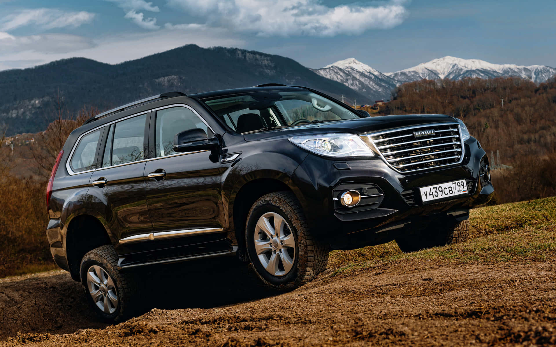 Sleek and Modern Haval SUV on a Mountain Road Wallpaper