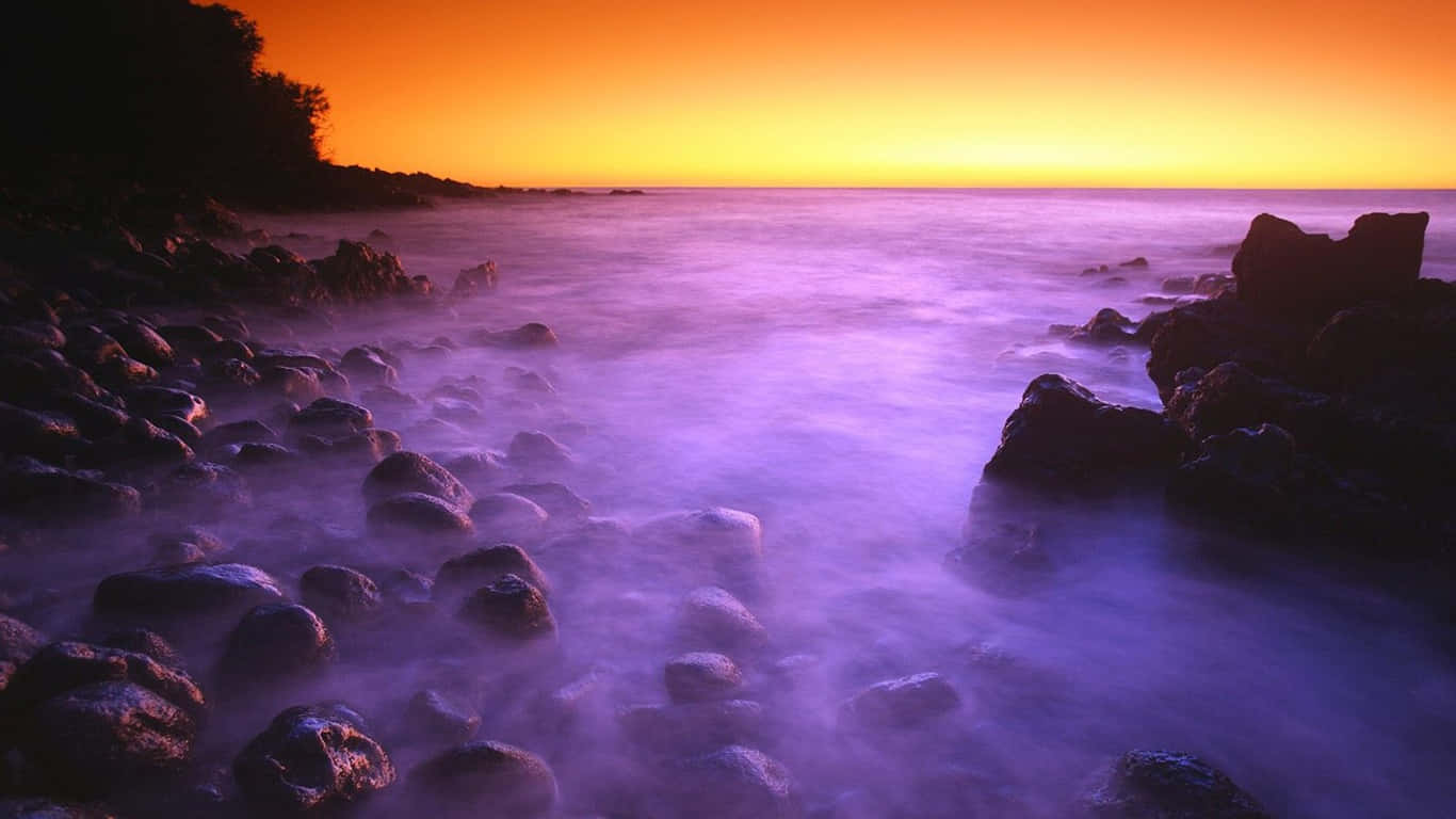 Genießensie Den Atemberaubenden Blick Auf Einen Hawaiianischen Sonnenuntergang. Wallpaper