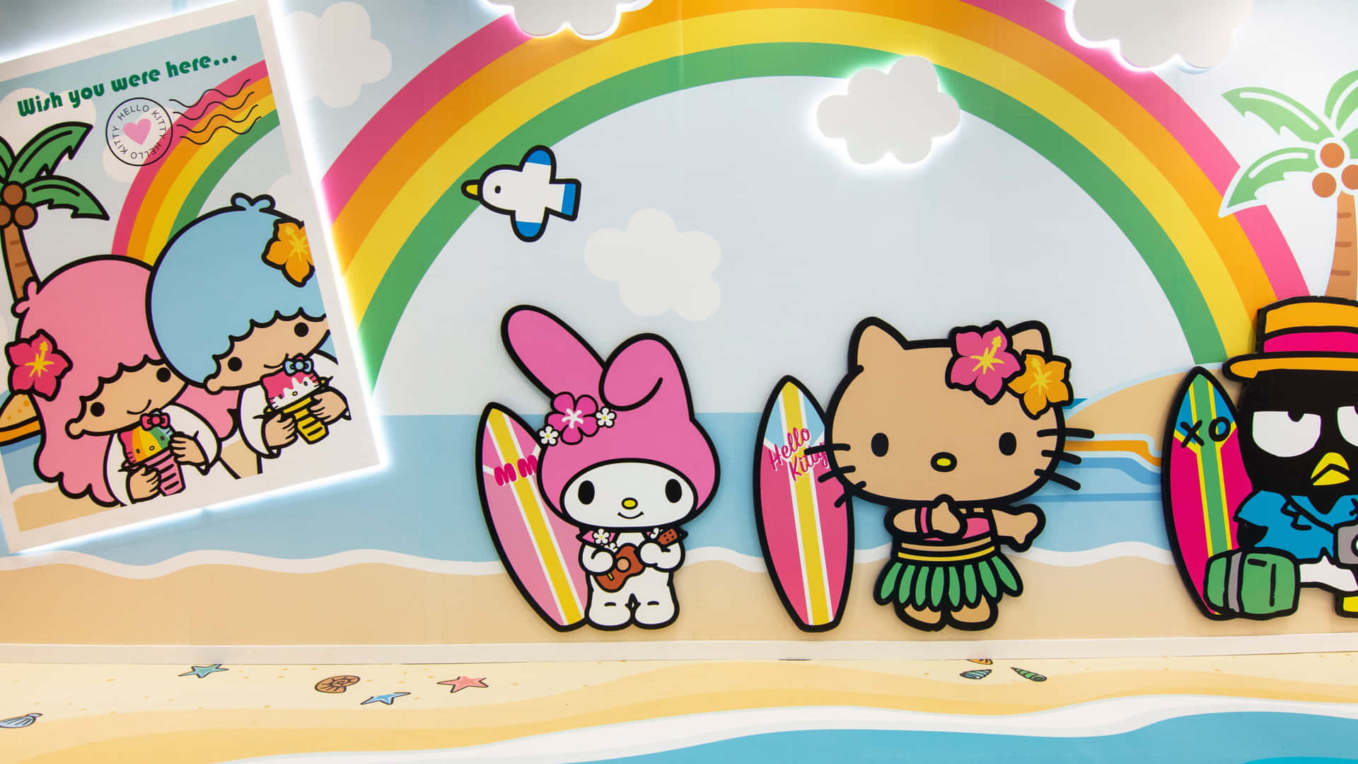 Download Hawaiian Hello Kittyand Friends Surfing Wallpaper | Wallpapers.com