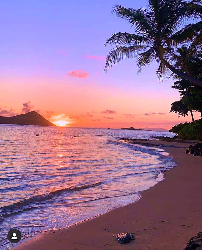 Hawaiischessonnenuntergangsstrandwellen-bilder