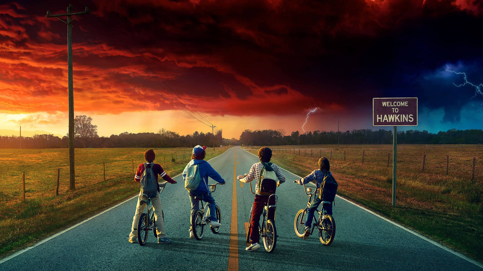 Mike, Dustin, Will and Lucas on their bikes in cover image of Stranger Things wallpaper.