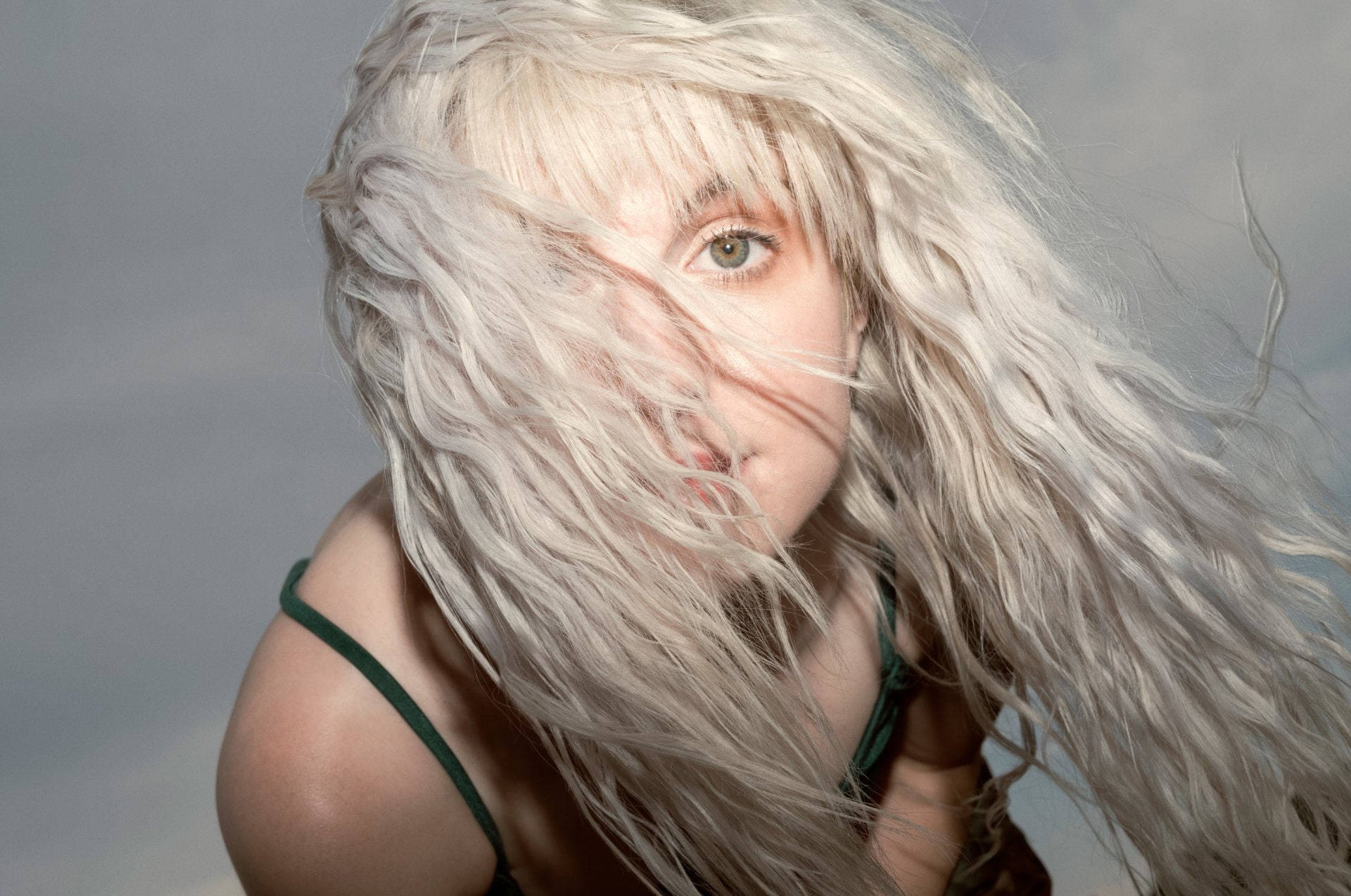 Hayley Williams With Curly Blonde Hair Background