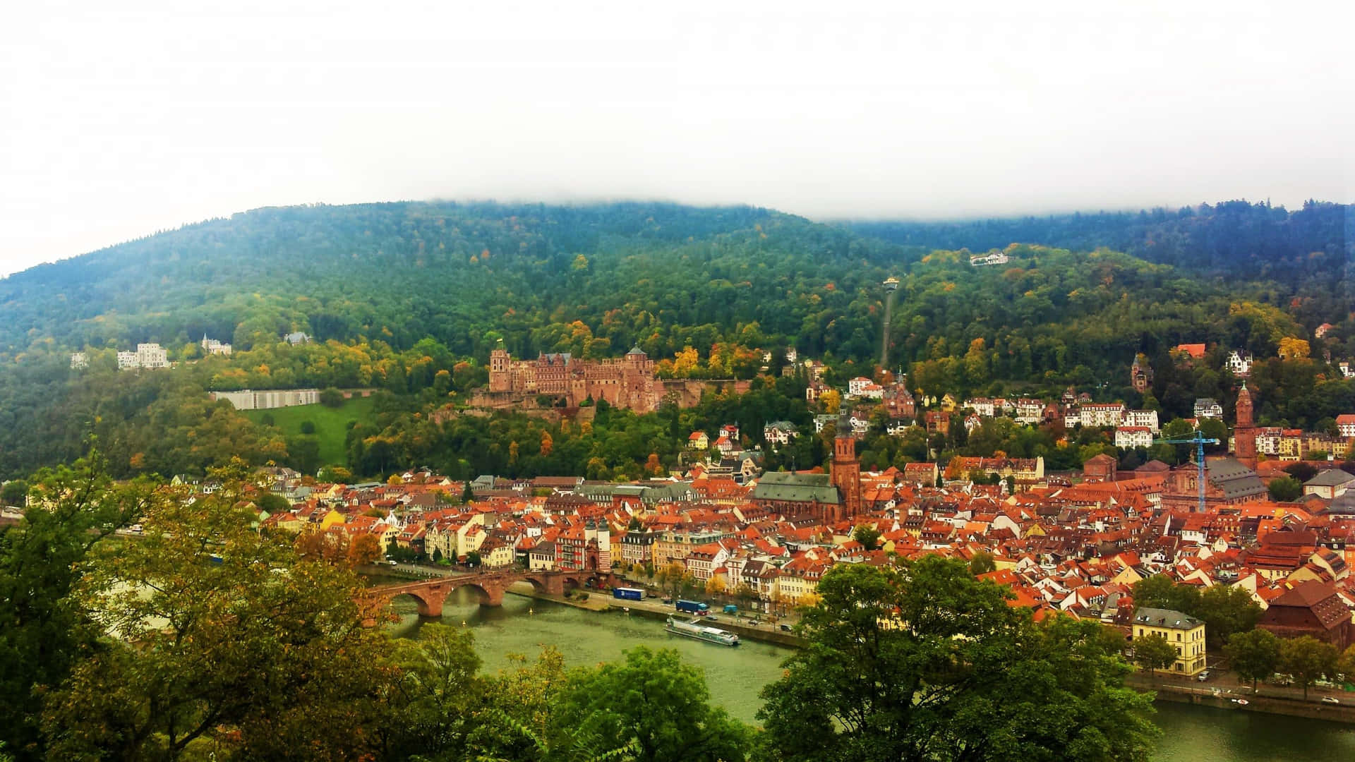 Hazy View Of Heidelberg Castle Wallpaper