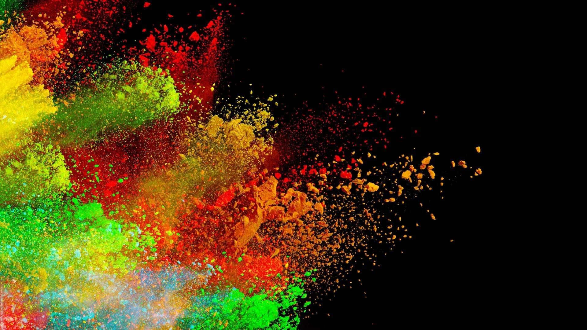 Colorful Powder Is Sprayed On A Black Background