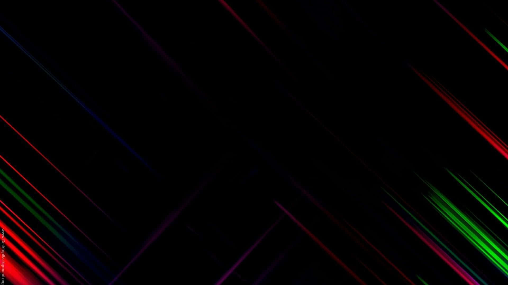 Download A Black Background With Colorful Lines | Wallpapers.com
