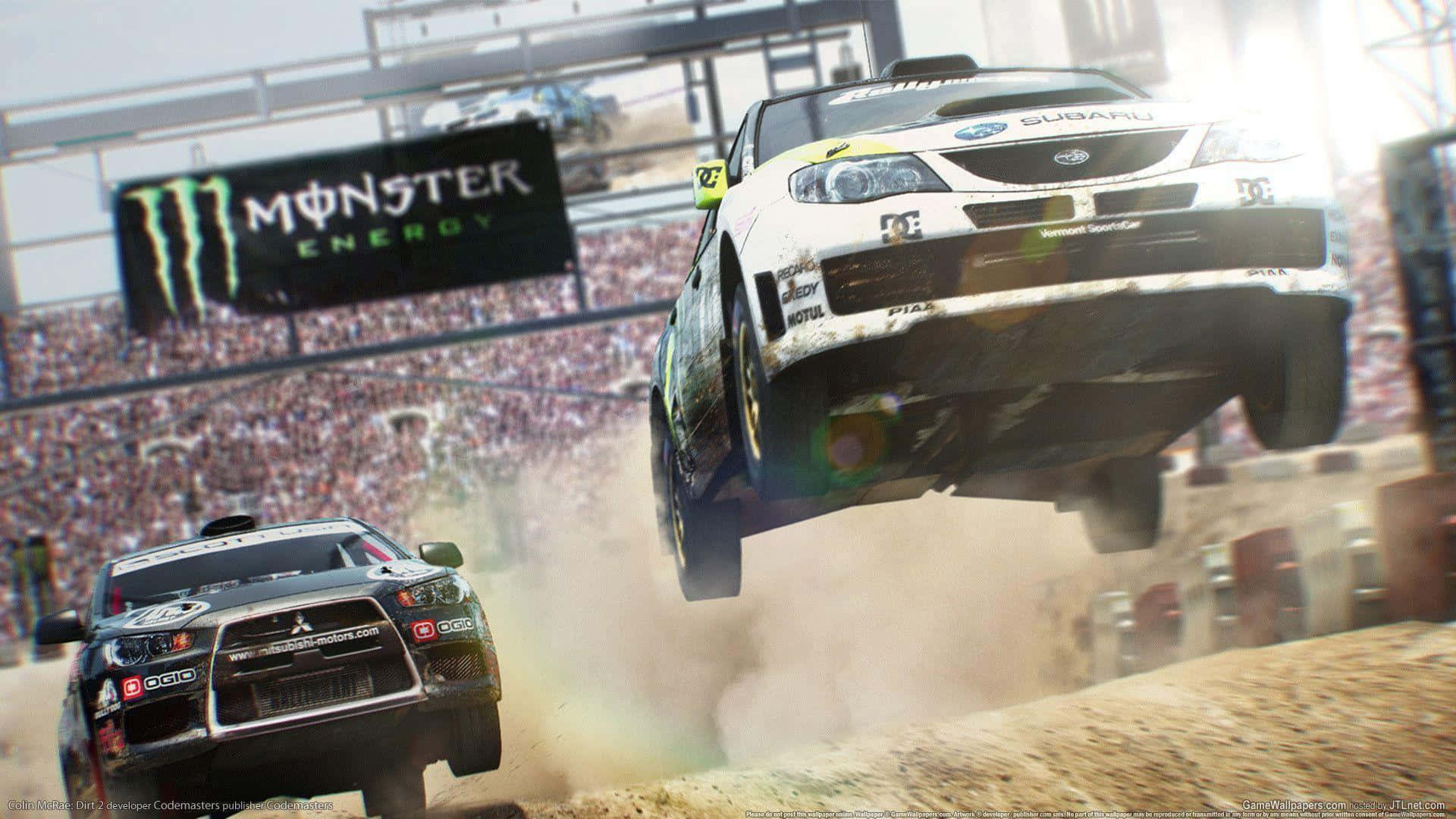 A Monster Truck Is Flying Over Dirt