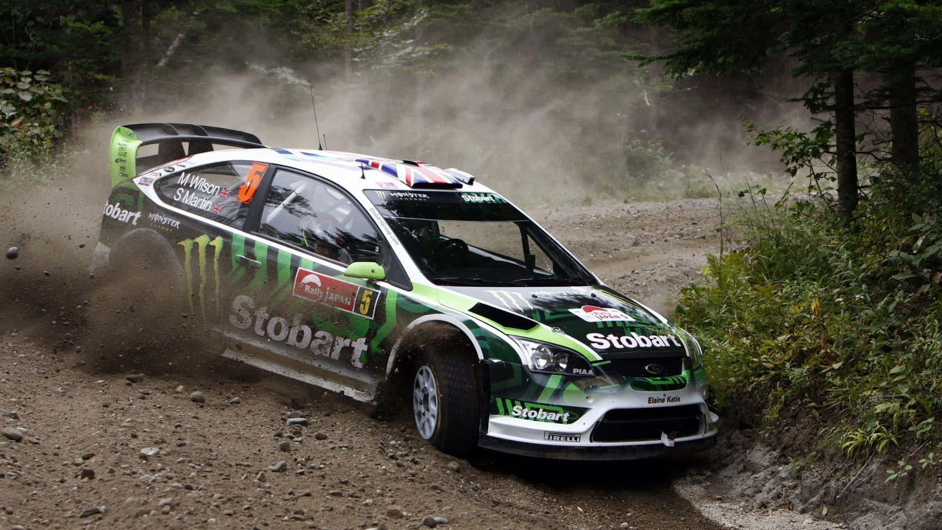 A Green Rally Car Driving Through A Forest