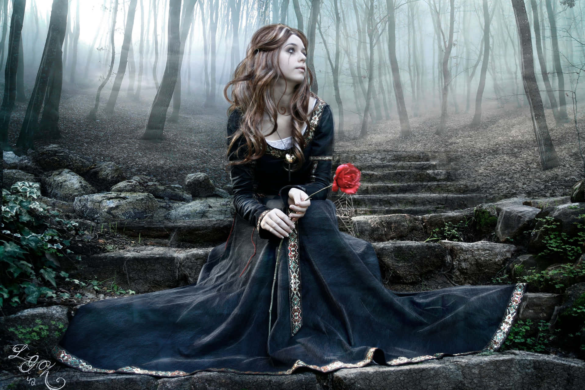 A Girl In A Black Dress Sitting On Steps In The Woods Wallpaper