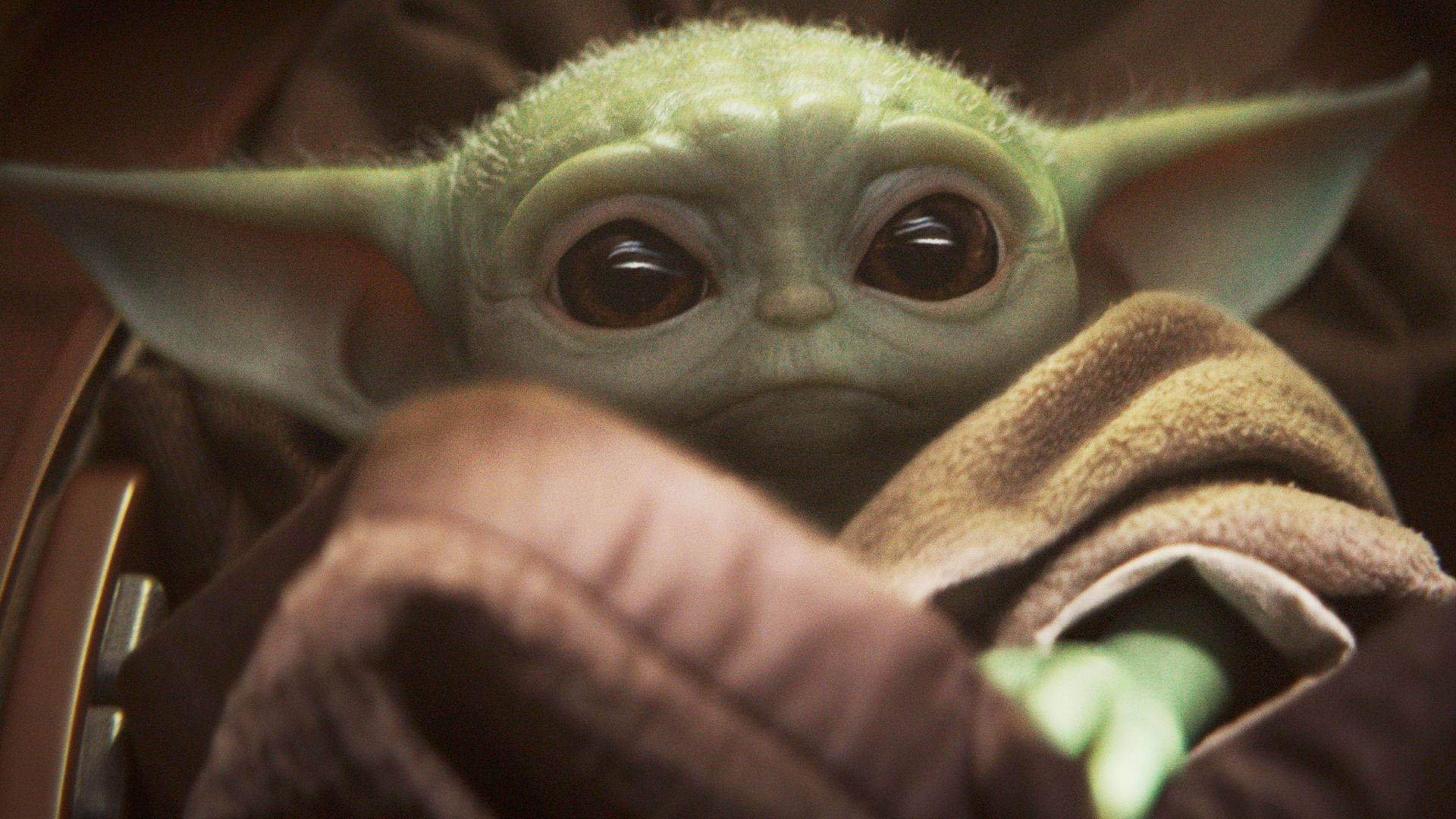 Baby Yoda Looking Adorably Cute Wallpaper