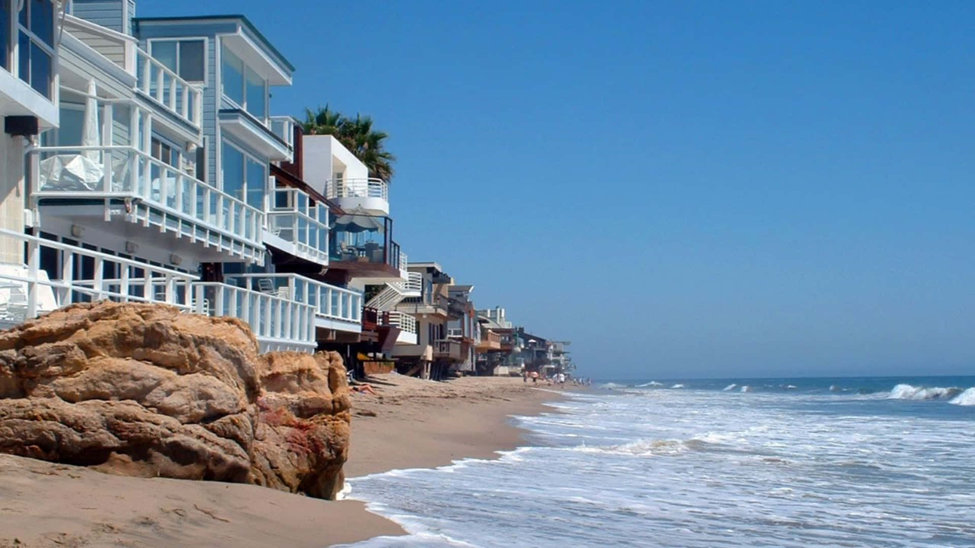 Soak in the beauty of Malibu with an unforgettable beach background