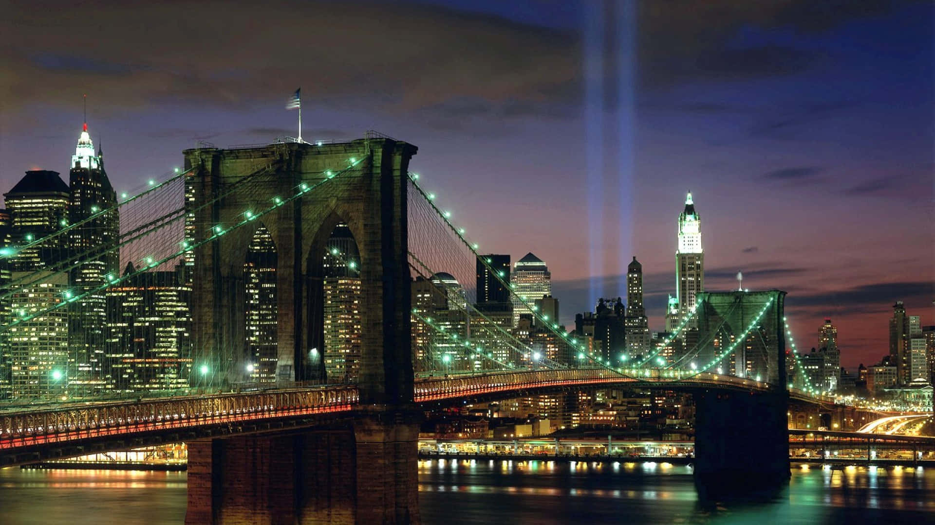 Fondode Pantalla Hd De Vista Nocturna Del Puente De Manhattan En Nueva York.