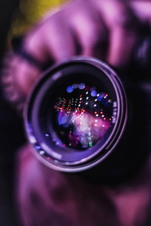 Hd Photography Of Camera Lens In Pink Neon Wallpaper