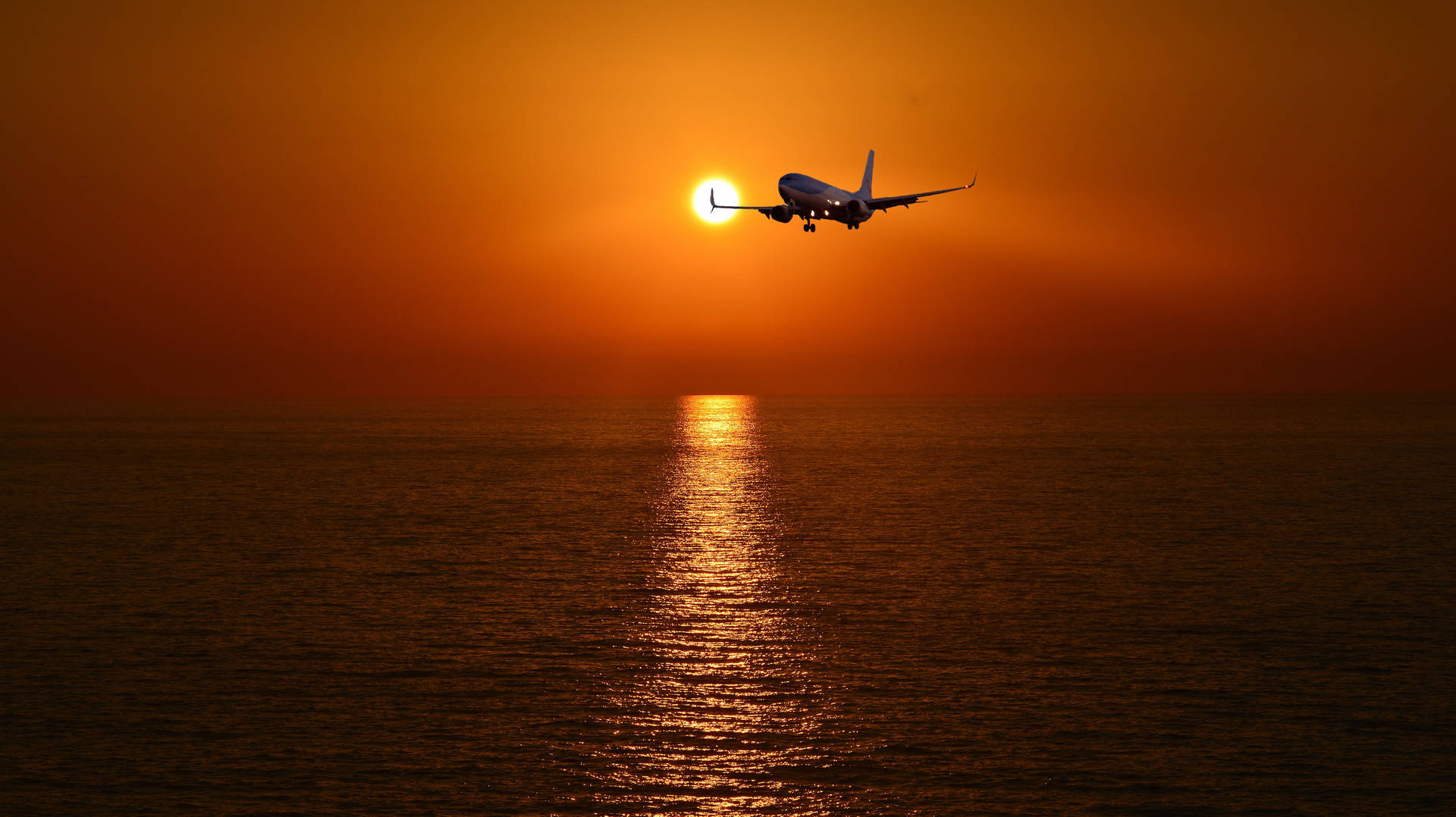 Hd Plane Flying Into Sunset