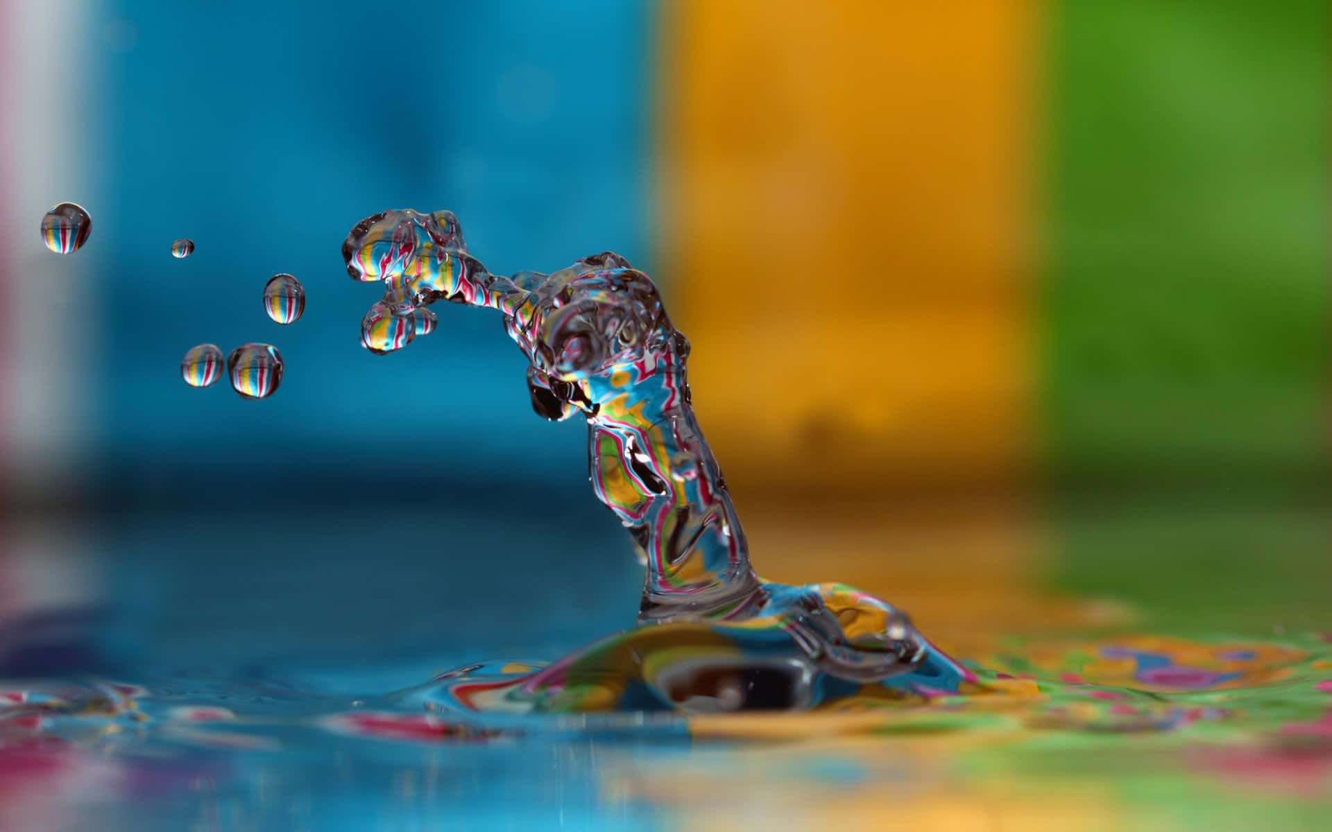 Water Drop On Colorful Background Wallpaper