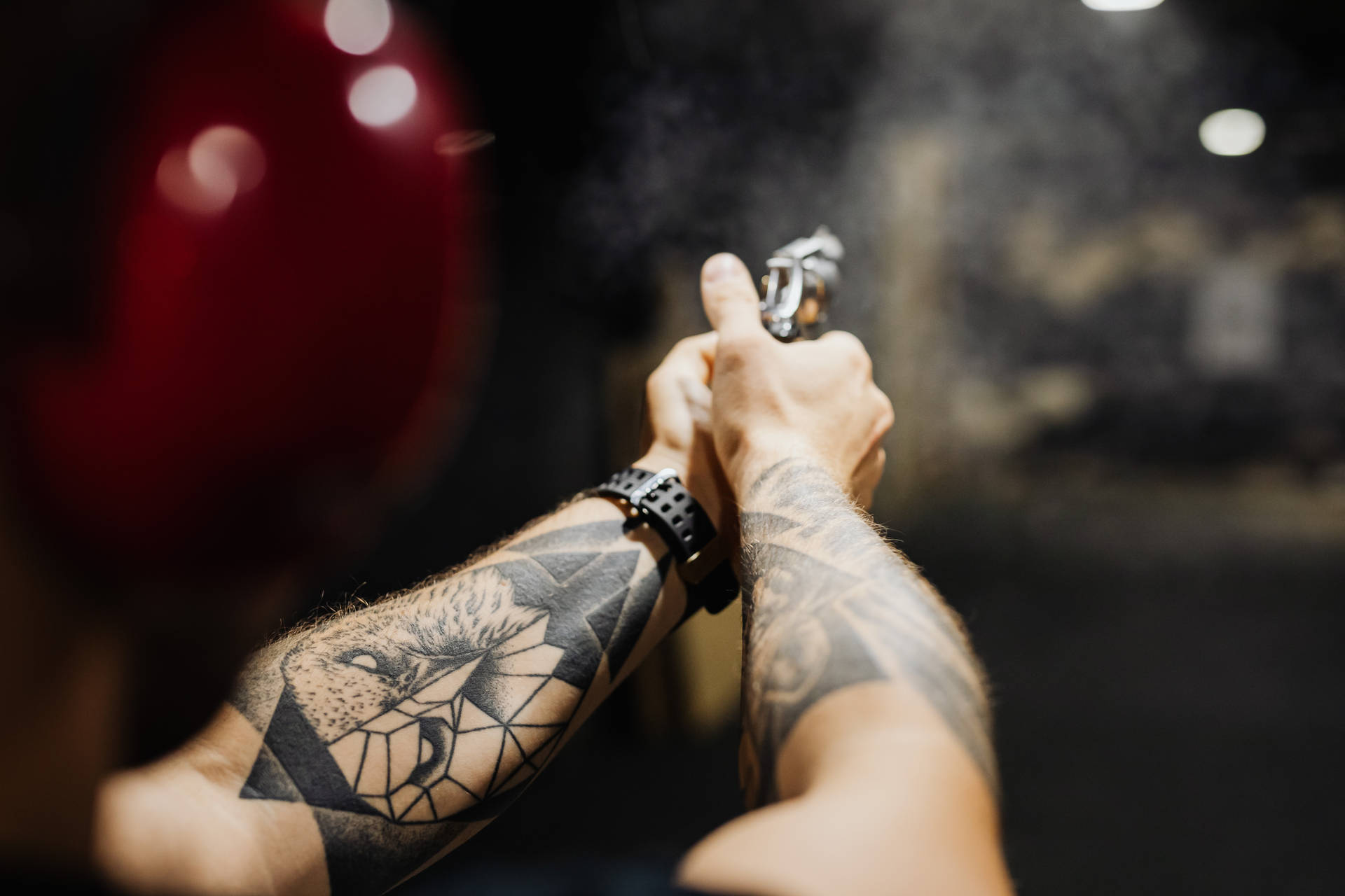 Hd Tattoo Person Holding Gun Wallpaper