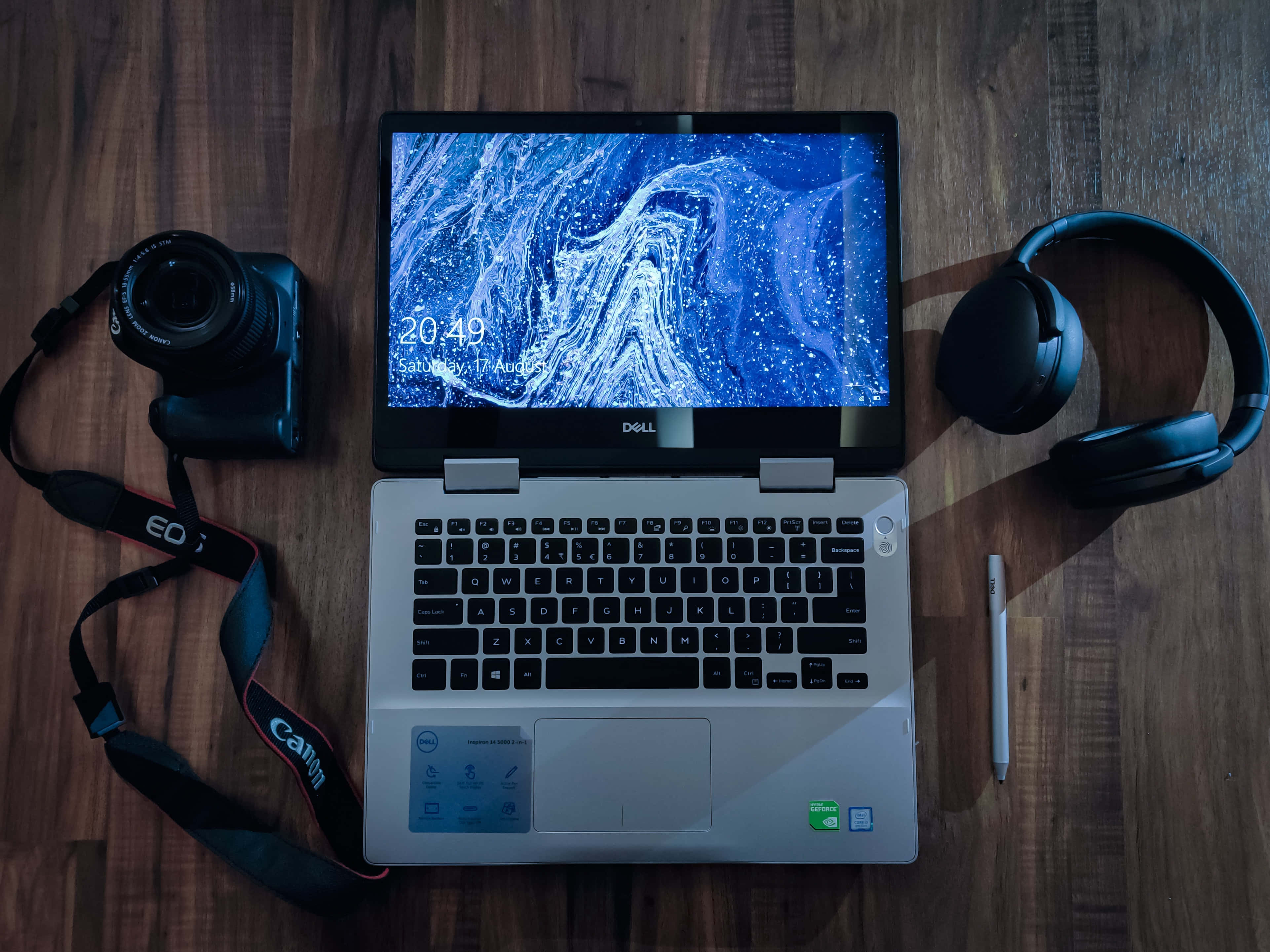Listen Up and Tune In with a Laptop and Headphones Wallpaper
