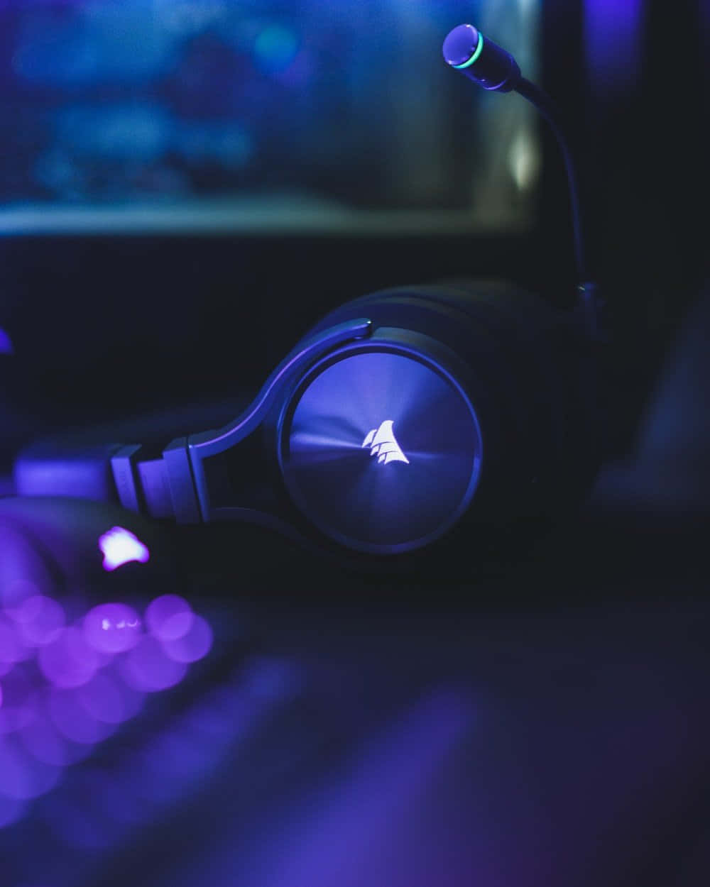 A Gaming Headset With Purple Lights On It