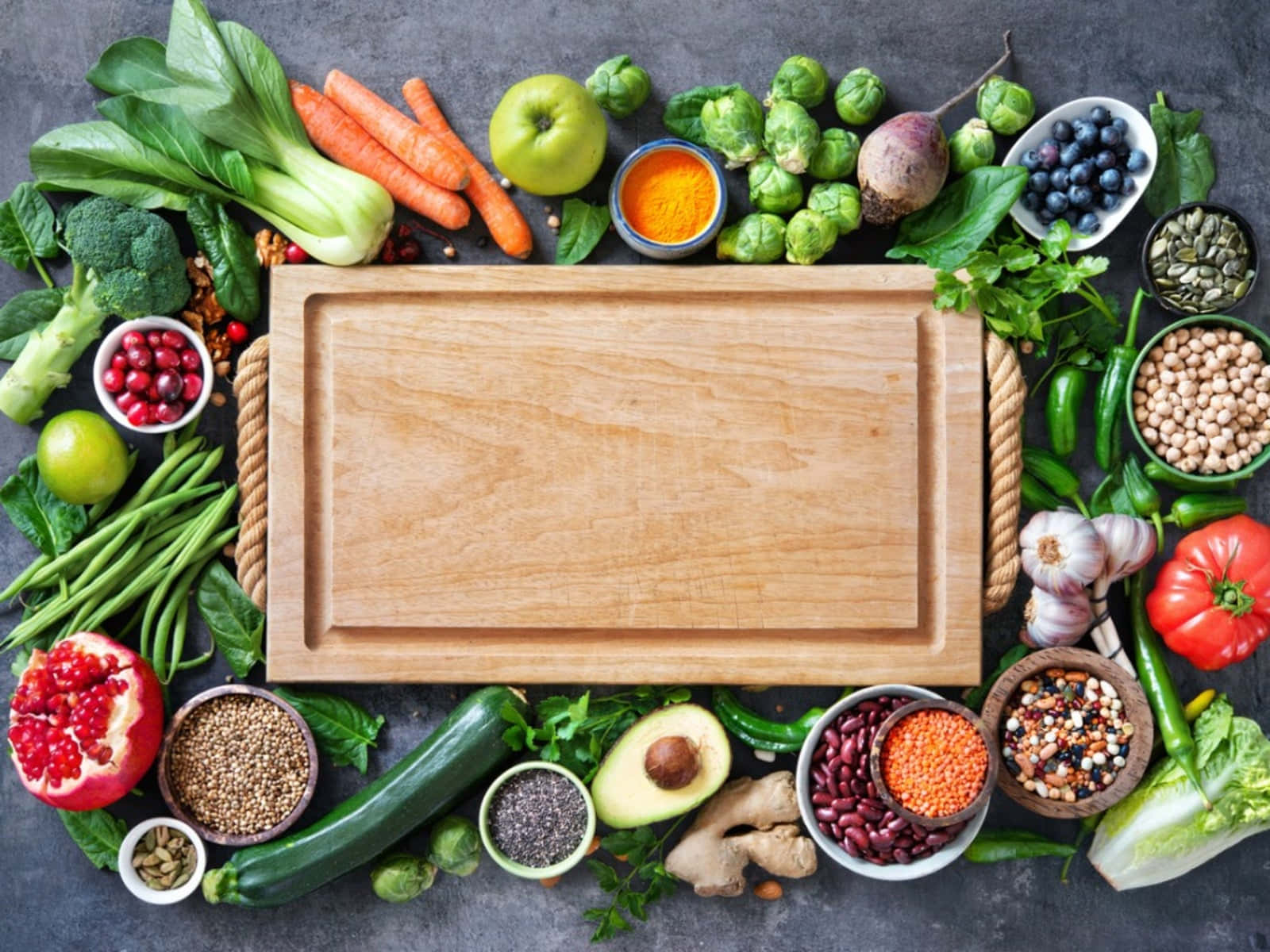 A Cutting Board With Vegetables And Fruits On It