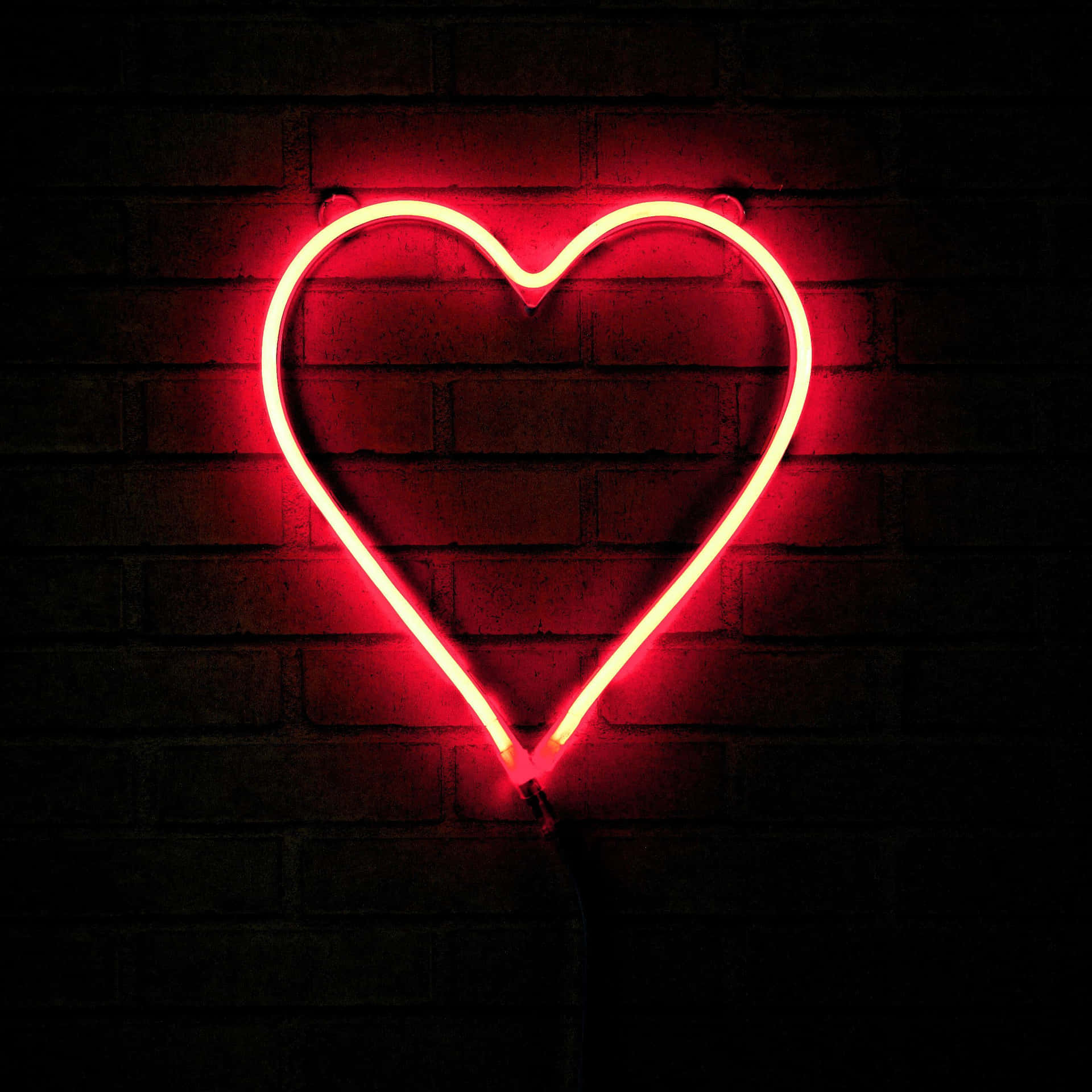 A Radiant Red Heart Shape Wallpaper
