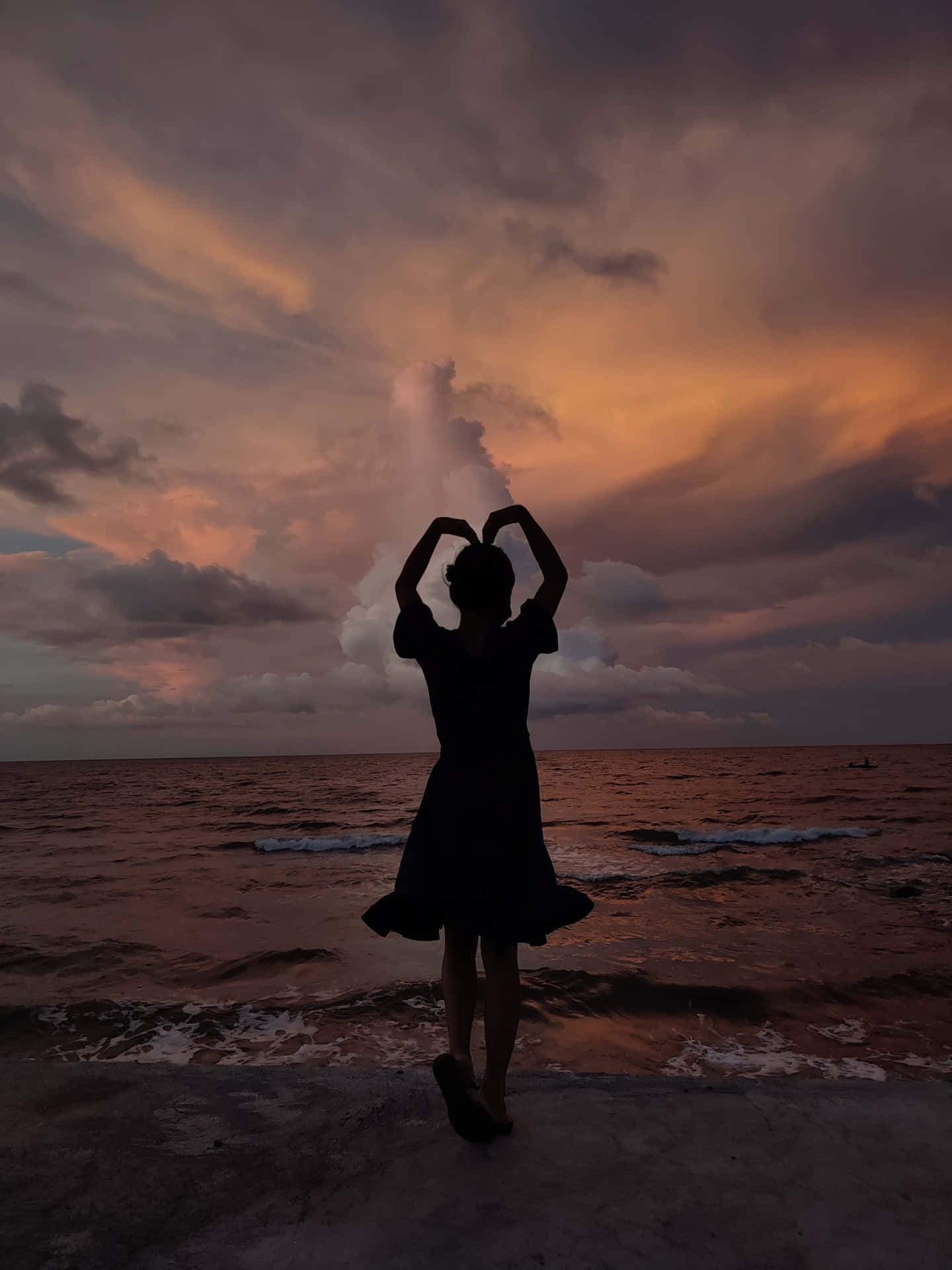 Romantic Heart Silhouette against a Dreamy Sky Wallpaper