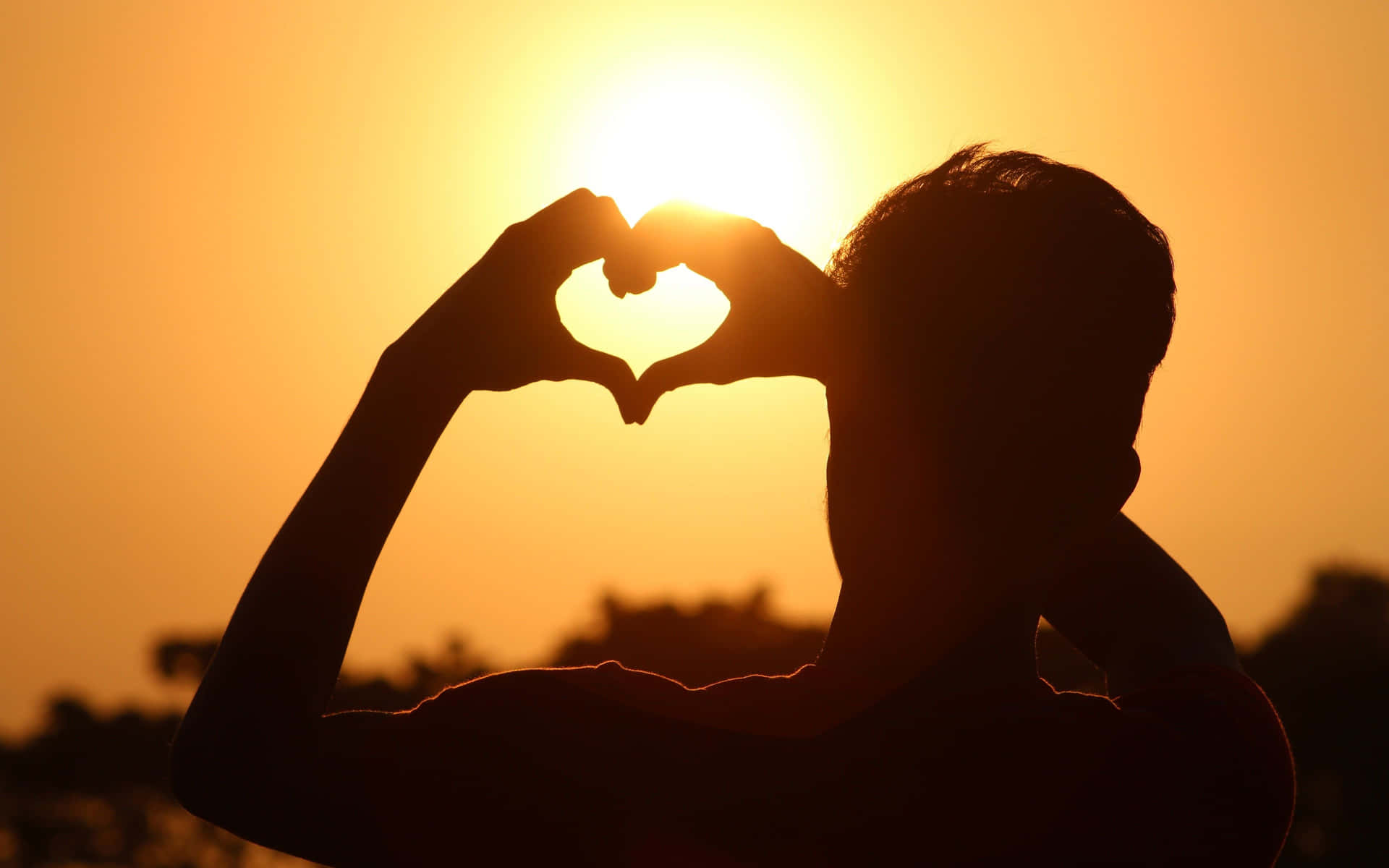 Romantic Heart Silhouette at Sunset Wallpaper