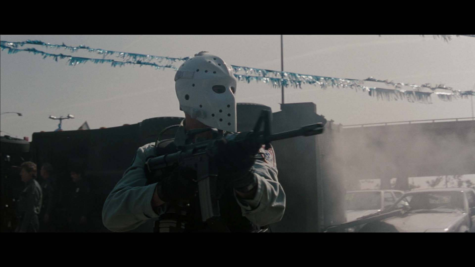 Heat Movie Scene Masked Man Gun Fight Wallpaper